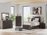Prendonea Charcoal Twin Panel Bed styled in room