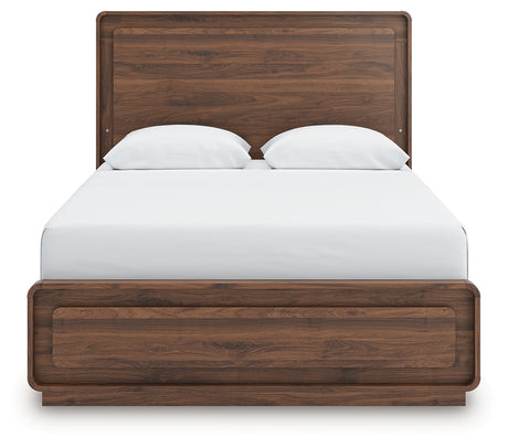 Side angled look of Fortlorn panel bed in rich walnut