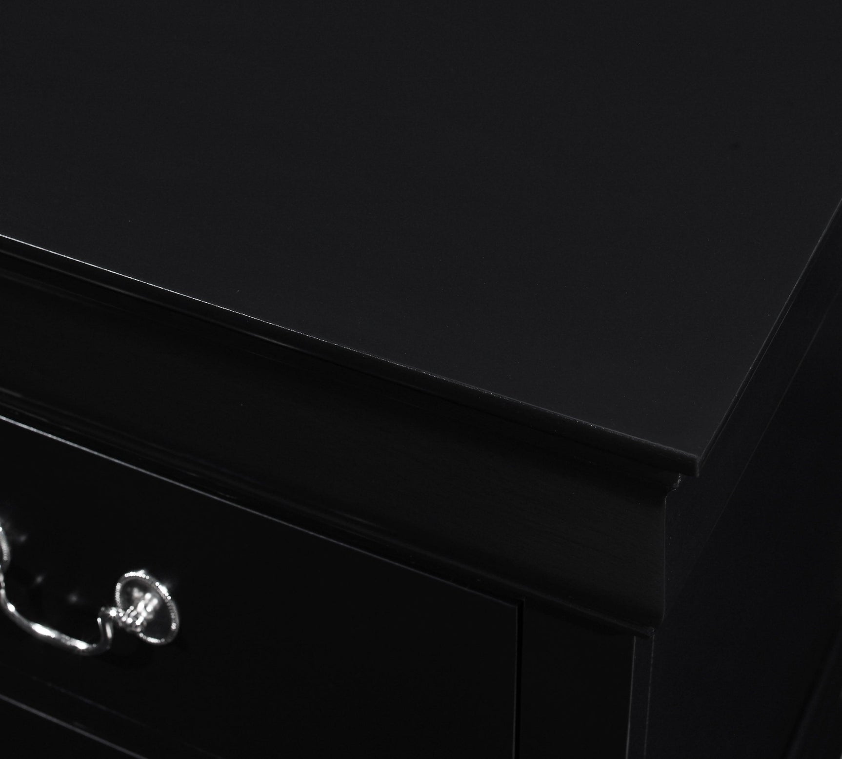 Lighting accentuating Louis Philip nightstand’s sleek lines