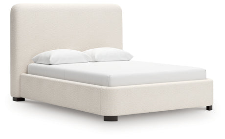 Brintstreet beige queen upholstered bed, side angle view