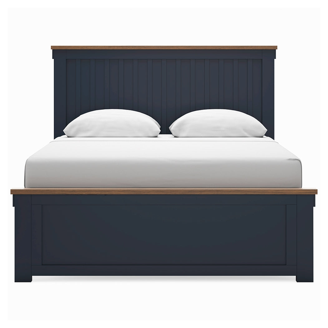 Side view of Landocken queen bed showing footboard