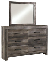 Close-up of Wynnlow dresser drawer with hooded pull hardware in dark finish