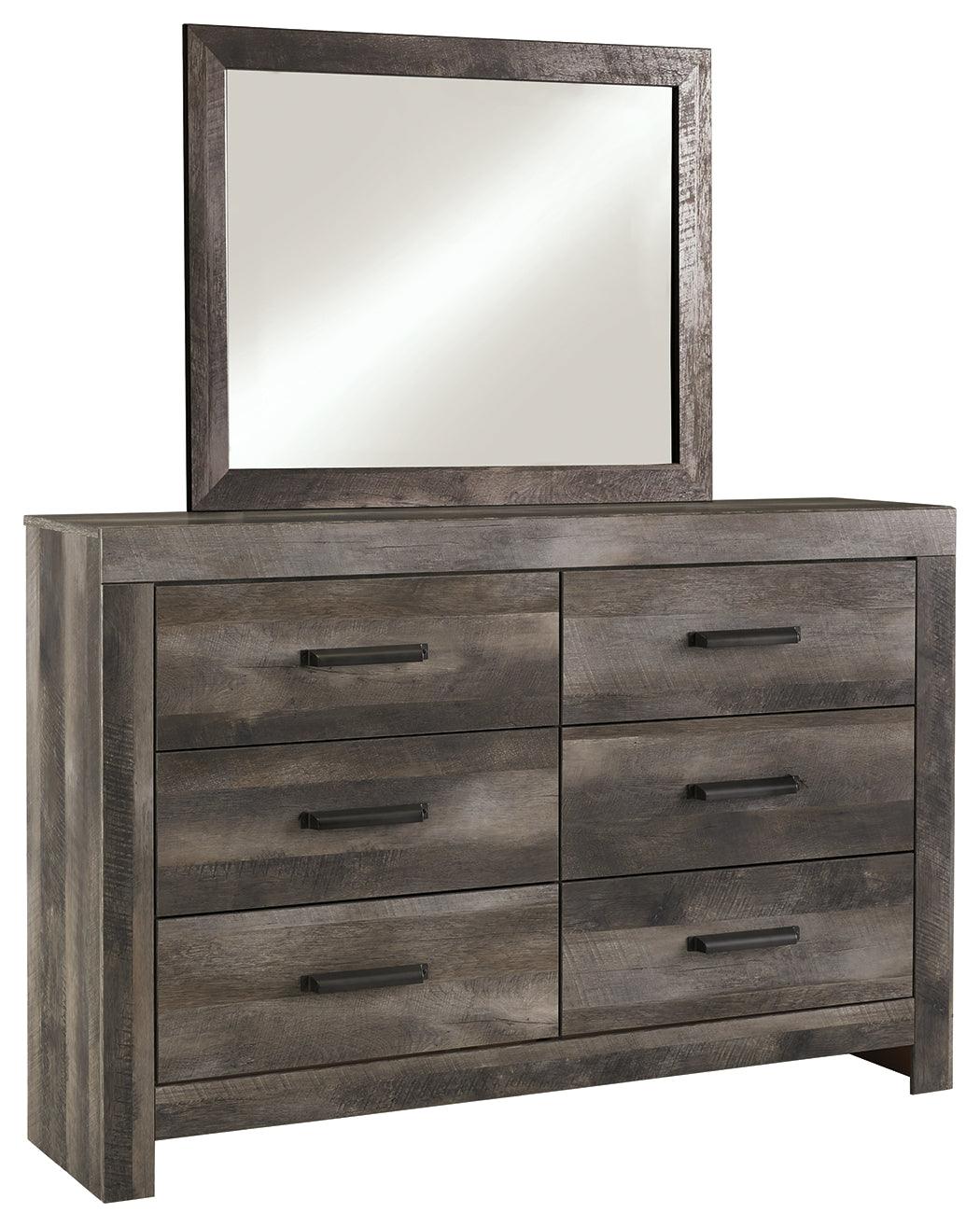 Close-up of Wynnlow dresser drawer with hooded pull hardware in dark finish