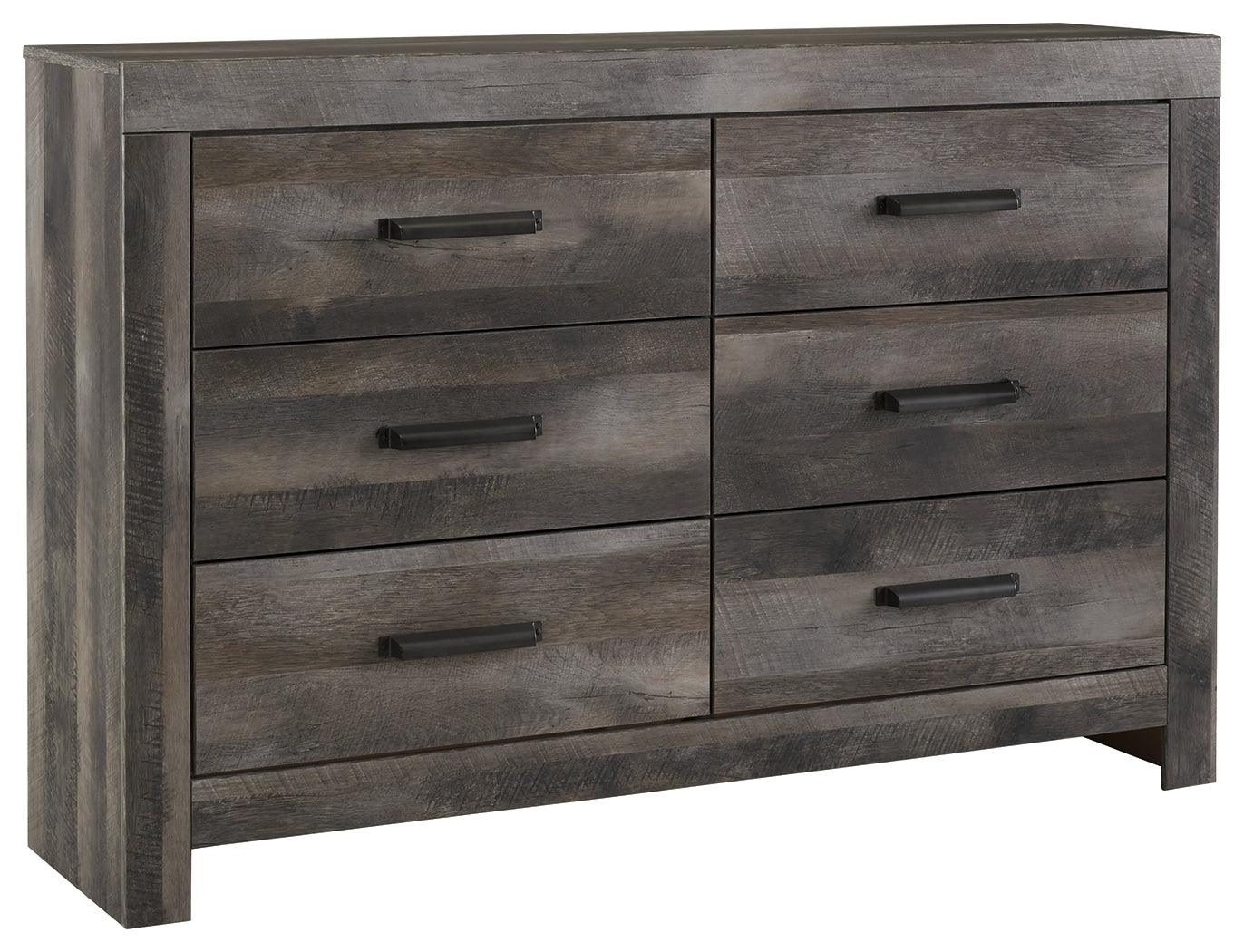 Wynnlow Gray Dresser angled view with visible hooded pulls