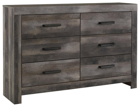 Wynnlow Gray Dresser angled view with visible hooded pulls