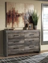 Close-up of Wynnlow Gray Dresser drawers and wood grain finish