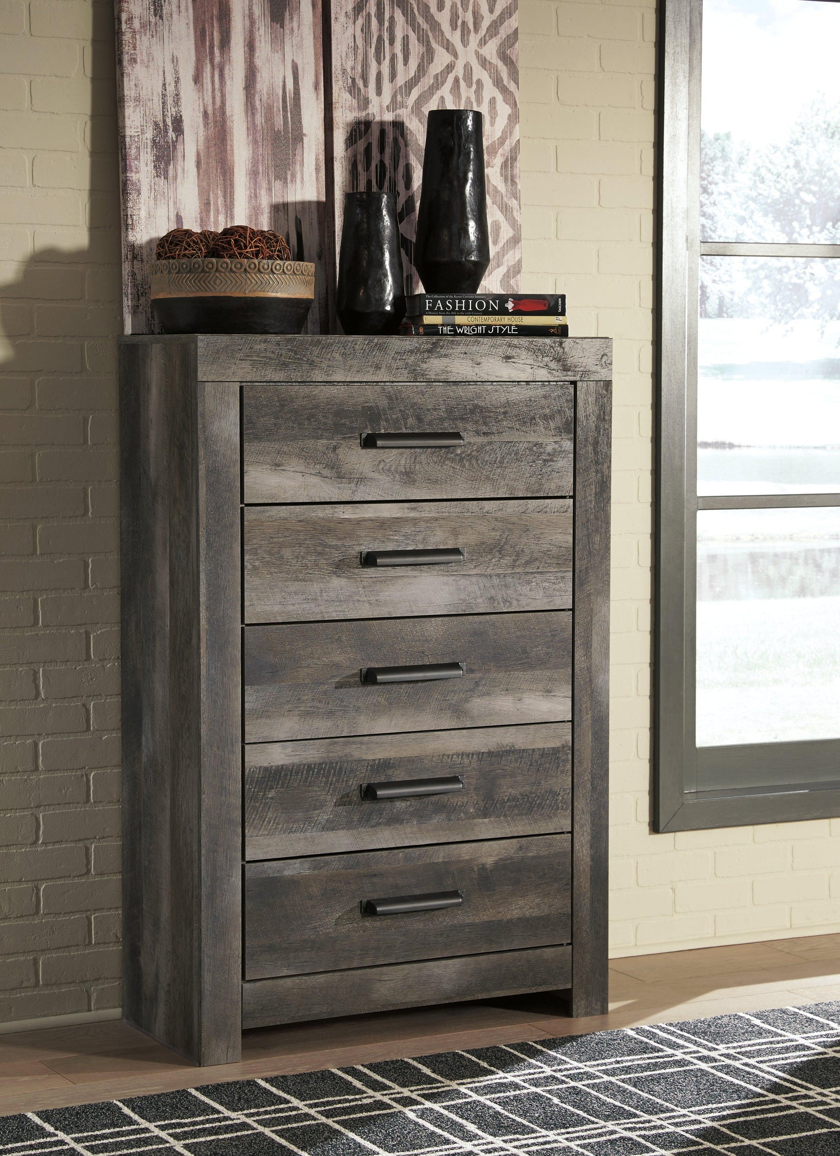 Wynnlow Gray 5-Drawer Chest close-up on hooded pull hardware