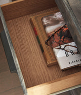 Wynnlow Gray 5-Drawer Chest top detail showing grain