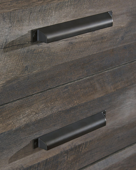 Wynnlow Gray 5-Drawer Chest distressed gray wood finish close-up