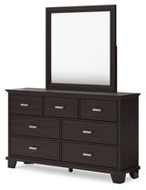Back view of Covetown dark brown dresser and mirror