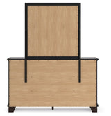 Side view of Covetown dresser with drawer details