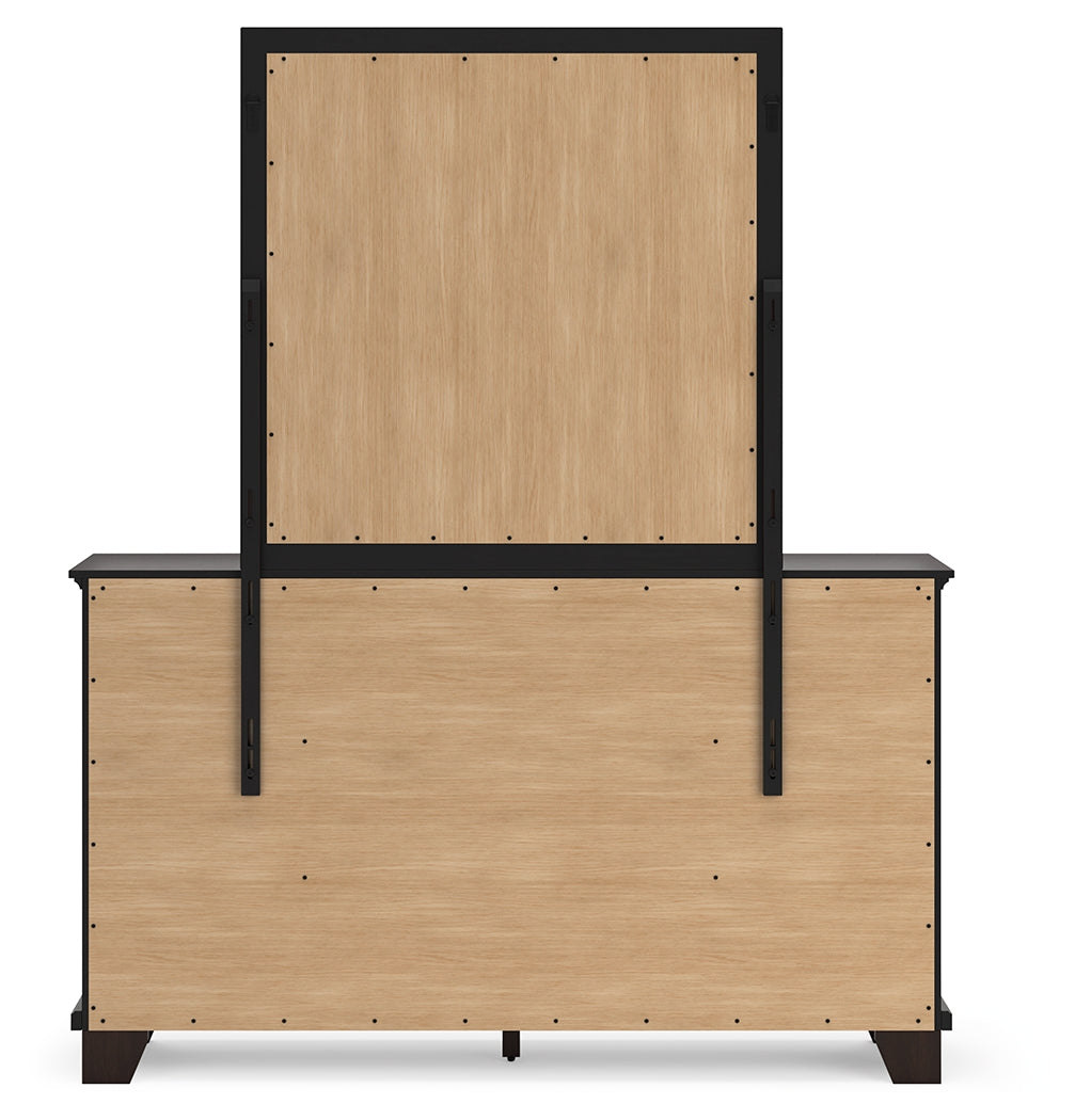 Side view of Covetown dresser with drawer details