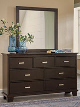 Covetown dark brown dresser with attached mirror, angled side view