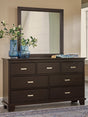 Covetown dark brown dresser with attached mirror, angled side view
