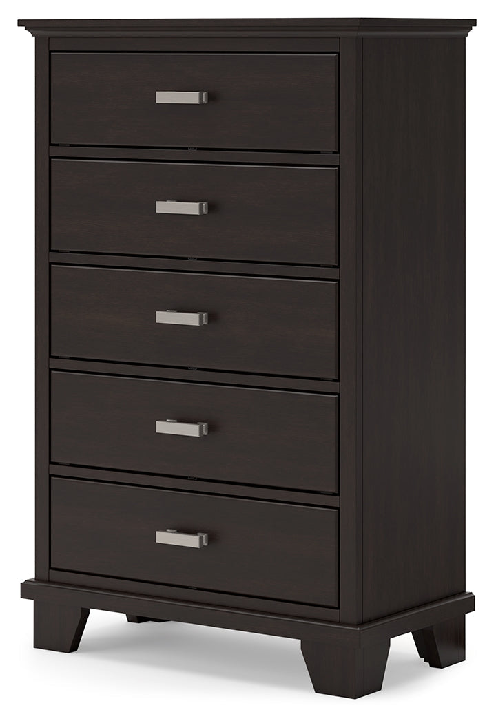 Close-up of bright nickel-tone metal bar pulls on dark brown chest
