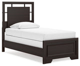 Covetown dark brown twin panel bed side angle view