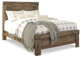 Trinell Brown Queen Panel Bed angled corner detail