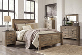 Complete Trinell bedroom collection furniture setting
