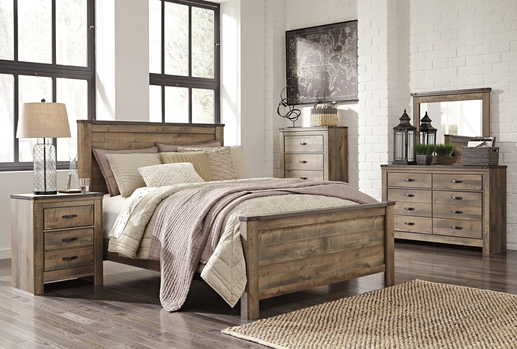 Complete Trinell bedroom collection furniture setting