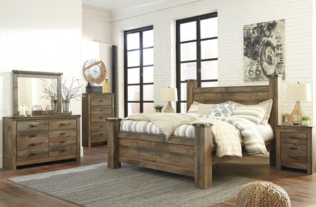 Trinell King Poster Bed showcasing headboard cubbies