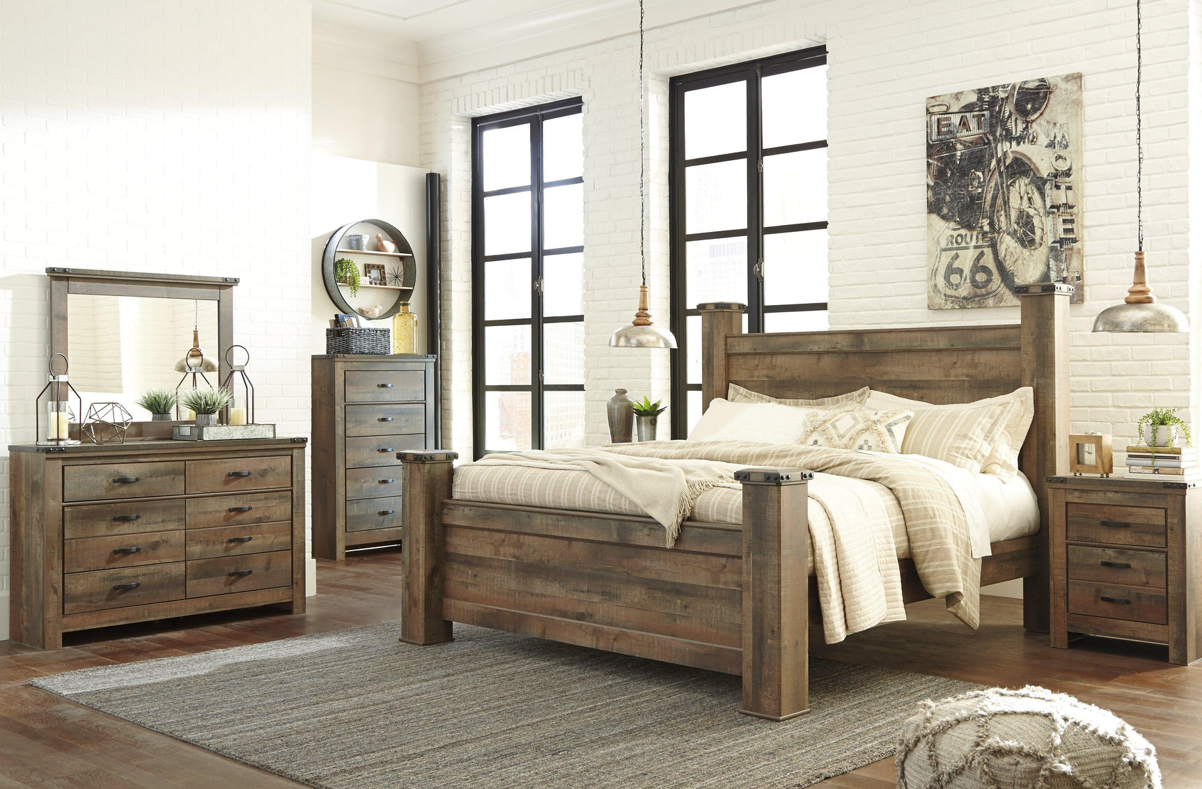 Detailed view of footboard drawers on Trinell Poster Bed
