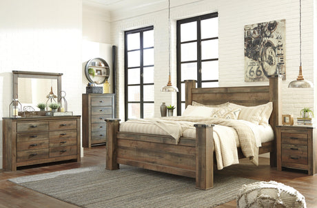 Detailed view of footboard drawers on Trinell Poster Bed
