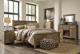 Trinell King Panel Bed close-up of footboard plank details