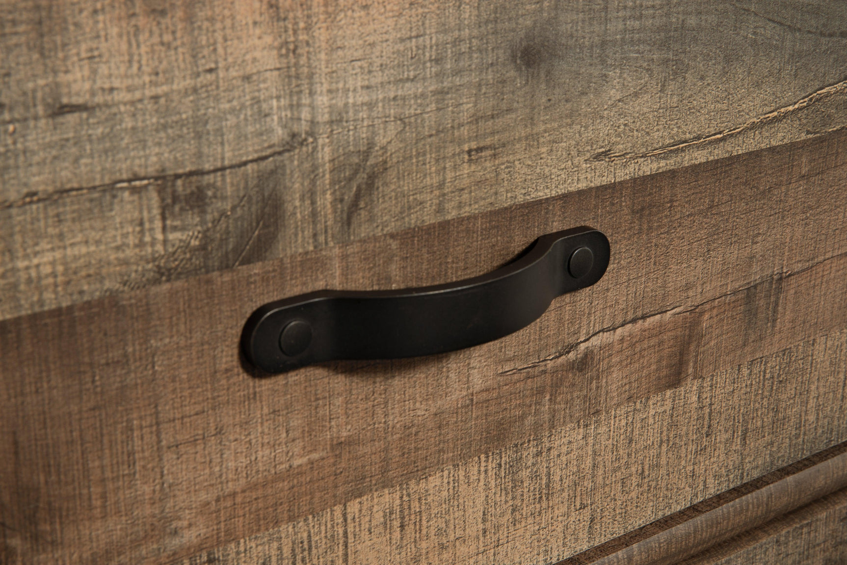 Drawer handles and nailhead accent on drawer front