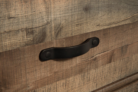Drawer handles and nailhead accent on drawer front