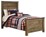 Trinell Brown Twin Panel Bed detailed headboard view