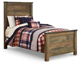 Trinell Brown Twin Panel Bed side angle