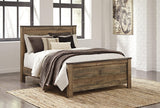 Trinell Brown Queen Panel Bed footboard detail