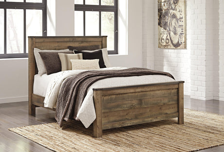 Trinell Brown Queen Panel Bed footboard detail
