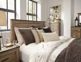 Trinell Brown Queen Panel Bed lifestyle setting
