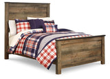 Side view of Trinell Full Panel Bed displaying footboard and rails