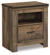 Trinell Brown Nightstand side angle showing nailhead trim