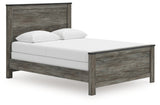 Close-up on headboard with nailhead accents