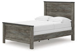 Close-up of Frandern bed's faux metal nailhead accents on headboard