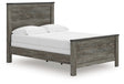 Frandern Full Panel Bed, side angle showing panel design and nailhead detail