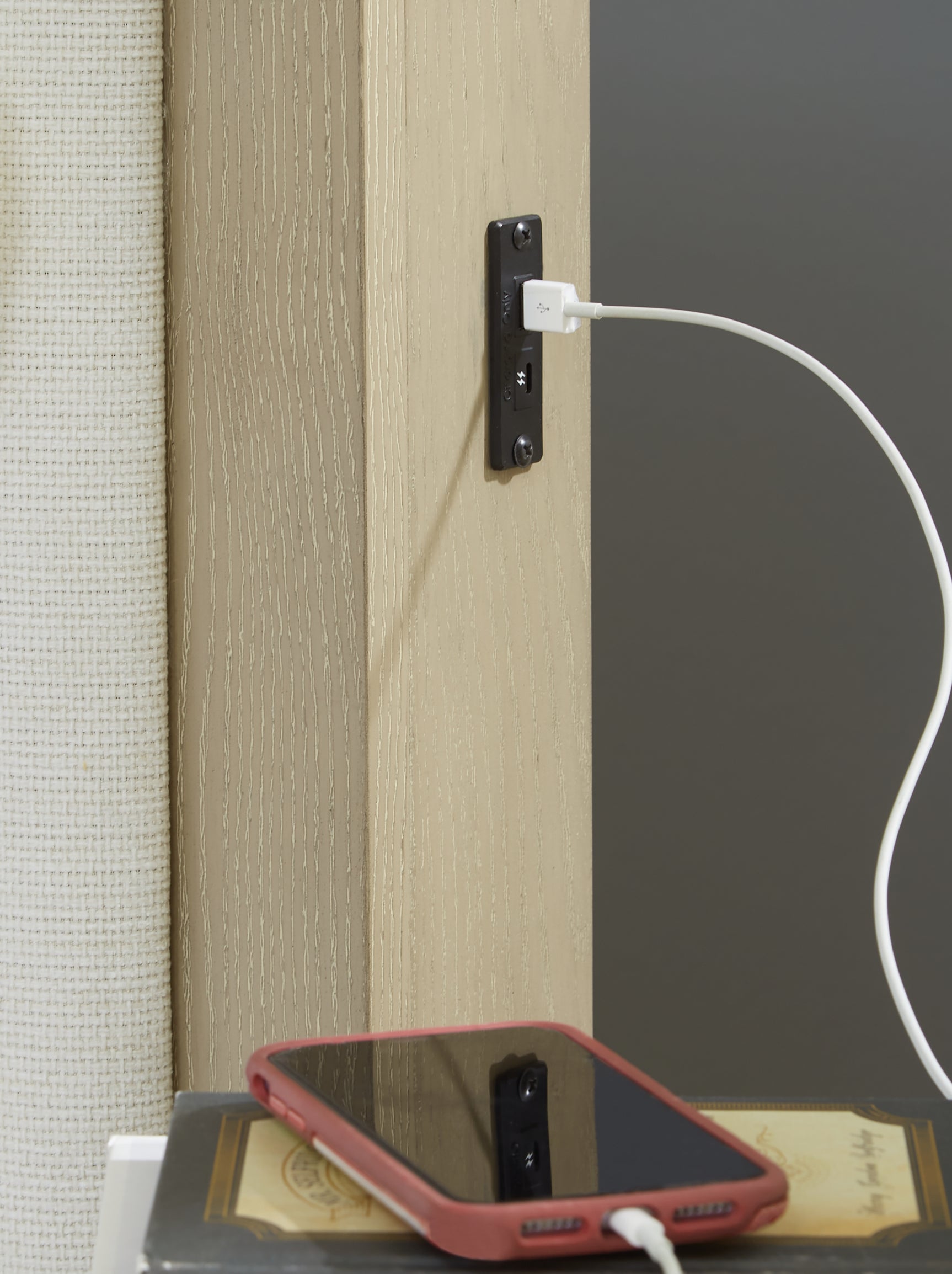 USB-A and USB-C charging ports on headboard