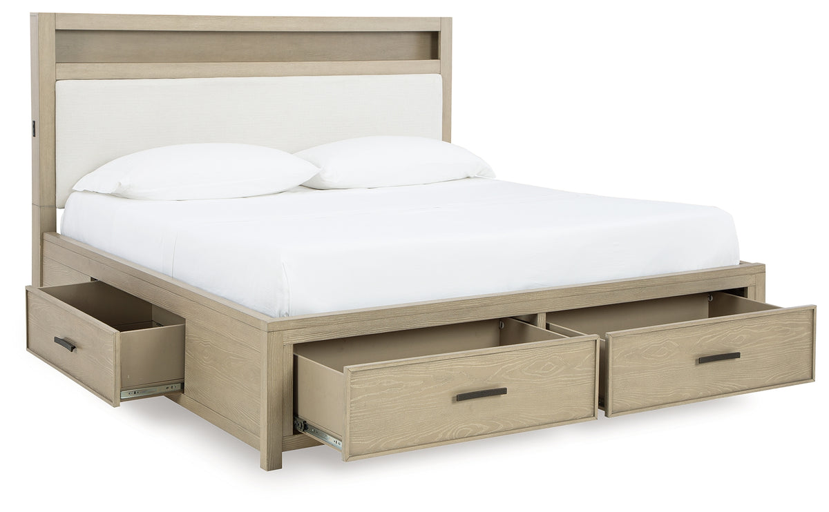 Storage drawers open in footboard of Calmoro bed