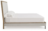 Side profile of Tomtyn Light Brown King Upholstered Bed