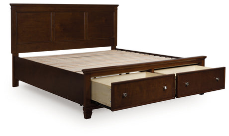 Danabrin Brown King Panel Storage Bed angled view with drawers open