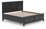 Close-up of wood grain and drawer knobs on Lanolee Black Bed