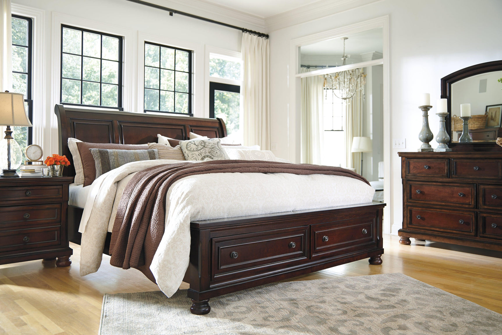 Porter Rustic Brown Queen Sleigh Bed styled in bedroom setting