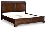 Head-on view of Trellington Brown Queen Sleigh Storage Bed