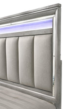 bedroom view of Vail Gray LED Upholstered Panel Bedroom Set dresser and mirror