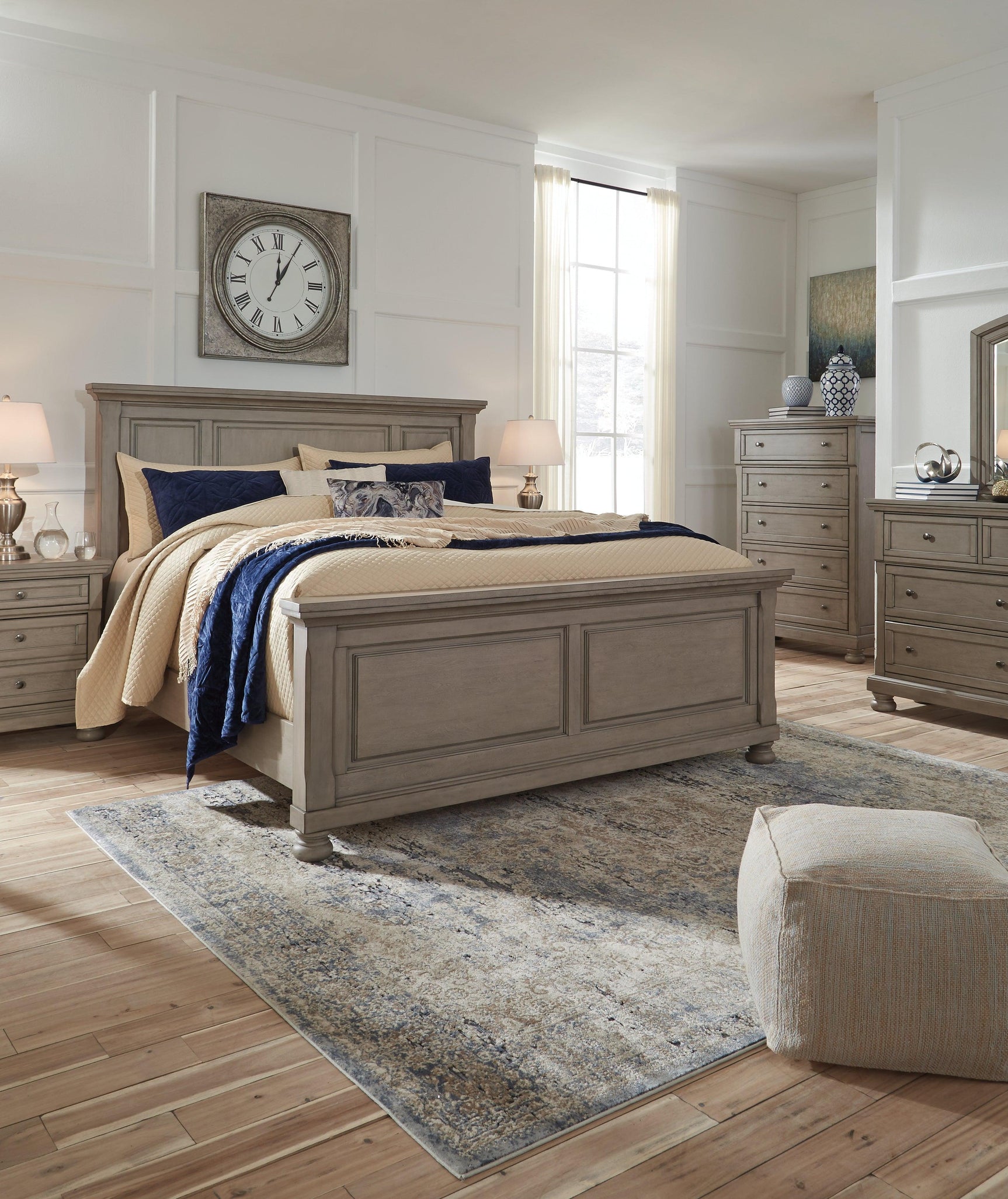 Detail of panel bed's inlaid wood panel and upholstery