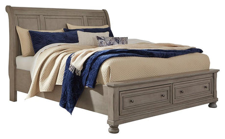Side view of Lettner Light Gray Queen Sleigh Bed showing drawer detail