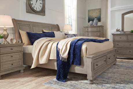 Styled bedroom featuring Lettner Light Gray Queen Sleigh Bed